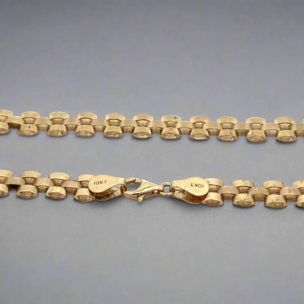 Close-up 9mm link lobster clasp 10K gold rolex gold chain