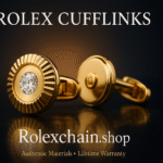 Pair of Rolex-inspired gold cufflinks with fluted bezel design and diamond accents on a glossy black surface — Rolexchain.shop.